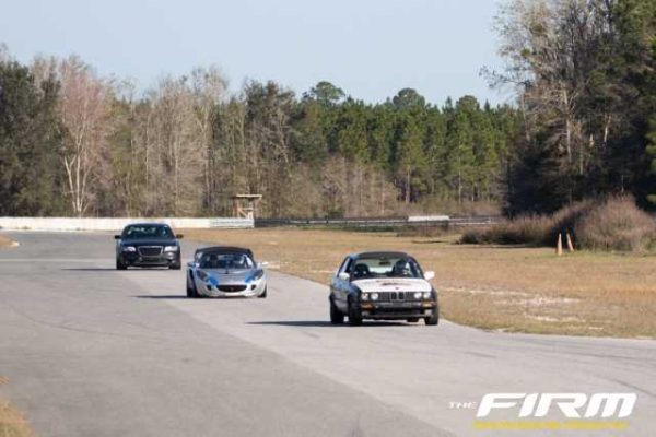 cars on track at The FIRM; what are time trials?